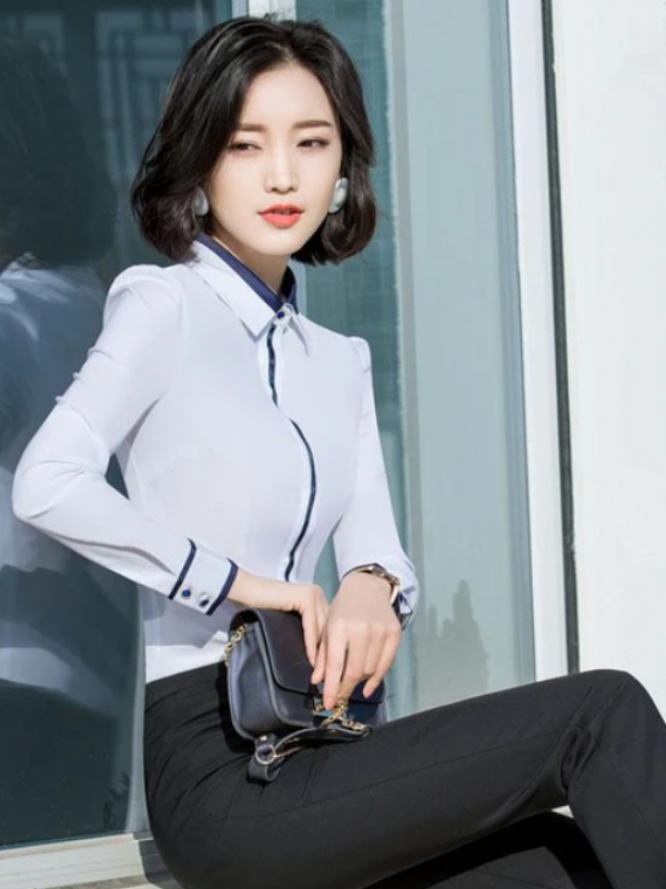 Kemeja kerja dengan lengan bervolume atau tumpuk